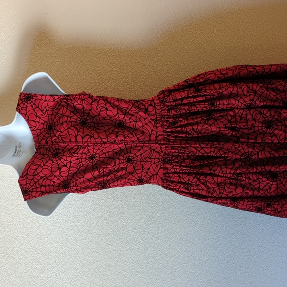 Pinup Couture Aurora Dress in Red with Flocked Black Spider Web - Picture 5 of 7